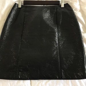 H&M black glossy leather like skirt.